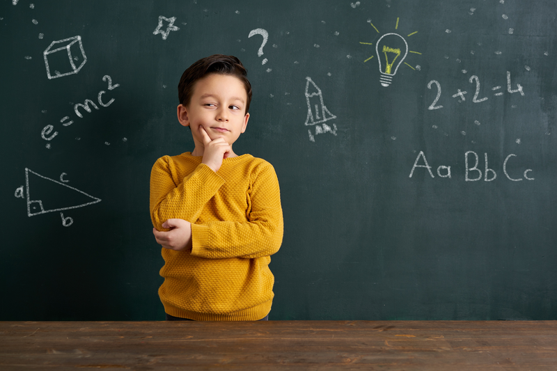 Boy and black board